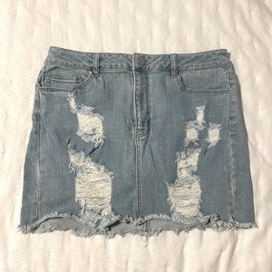 Light wash ripped jean skirt